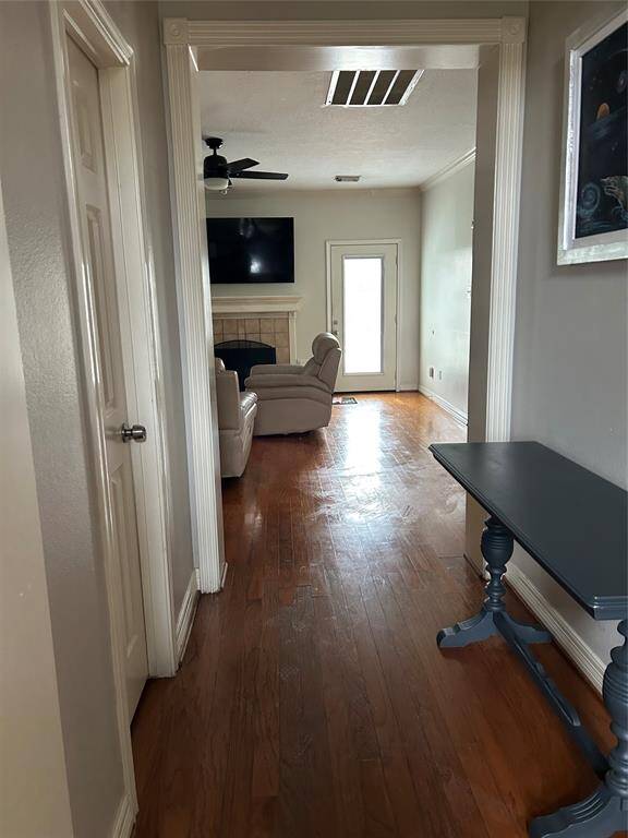 From foyer looking towards extended entry and family room