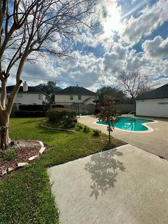 Pool & patio and still plenty of yard left!! A great back yard!!!
