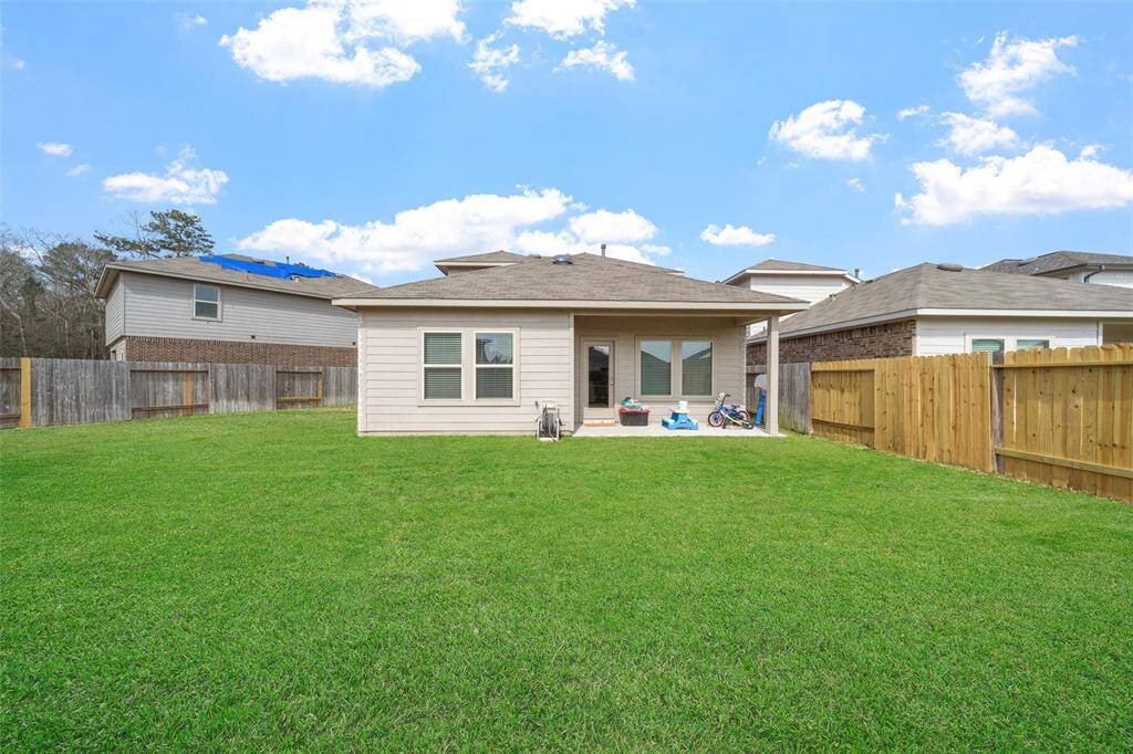 Enjoy your outdoor space, rain or shine with the covered patio.