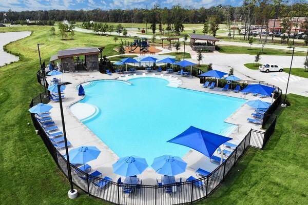 The community recreation center includes an amenity area, swimming pool, splash pad, community walking paths and a playground area.