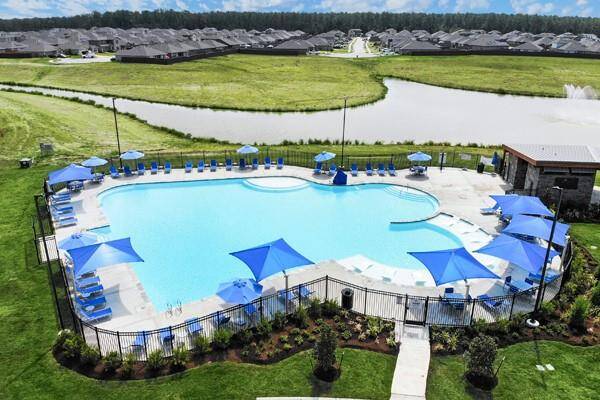 The community recreation center includes an amenity area, swimming pool, splash pad, community walking paths and a playground area.