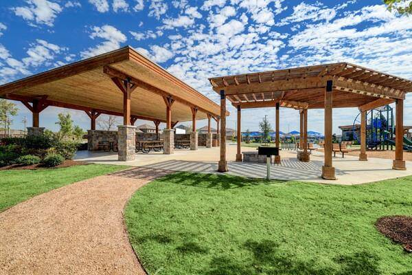 The community recreation center includes an amenity area, swimming pool, splash pad, community walking paths and a playground area.