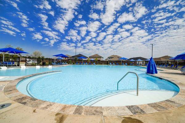 The community recreation center includes an amenity area, swimming pool, splash pad, community walking paths and a playground area.