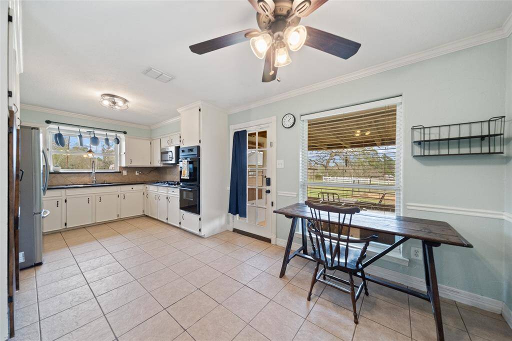 Another door in the kitchen with backyard access!