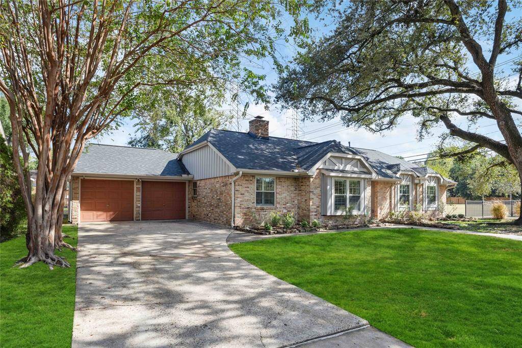 Enjoy a gorgeous, oversized lot framed with mature trees and a well-maintained yard. The roof was added in 2018.