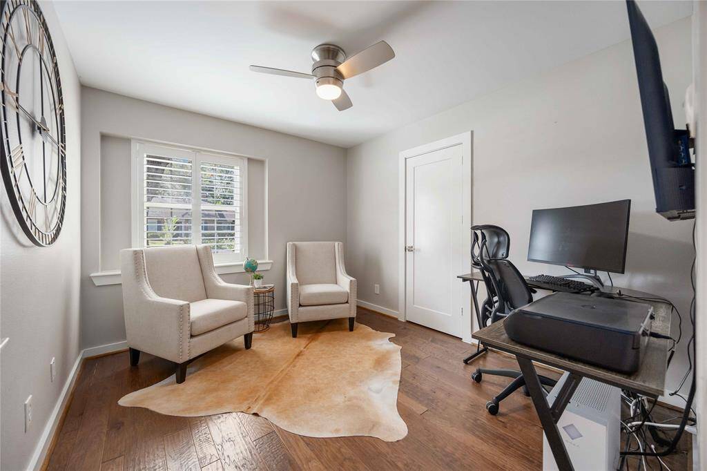 Bedroom one faces the front and offers the perfect space to sleep. Here it is being utilized as a study.