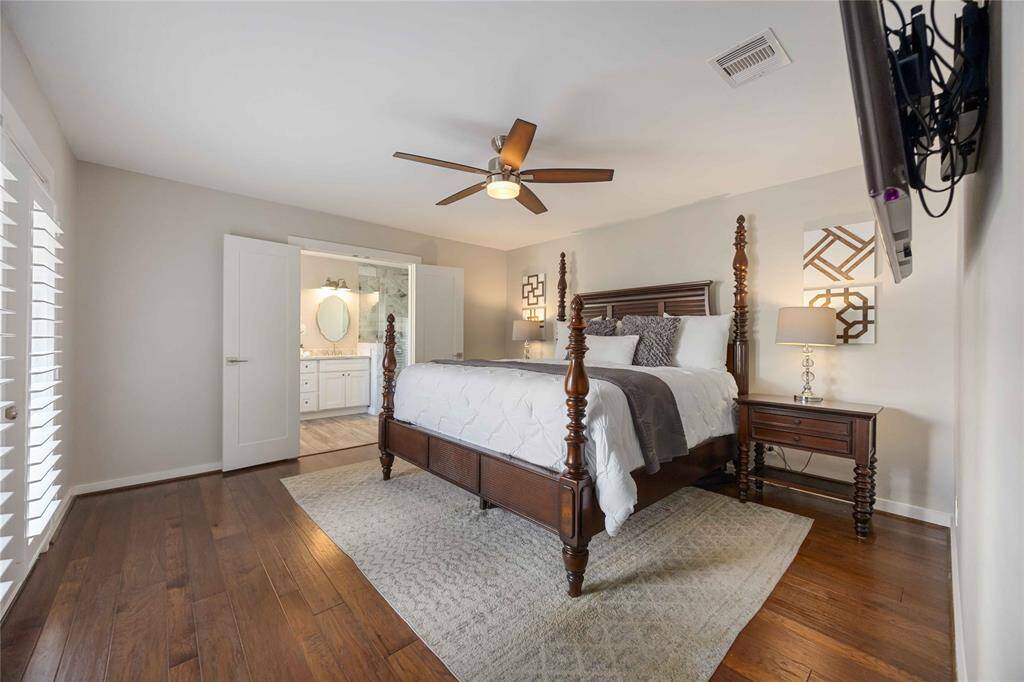 The primary suite is absolutely the epitome of relaxation. Double doors open to an unbelievable primary bath.