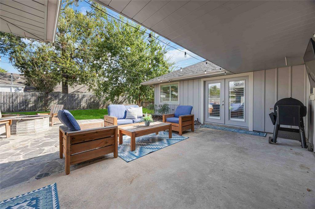 Partially covered, you'll have a space to pull things close to the home during the rain. It's also the perfect spot to keep a grill or a smoker.