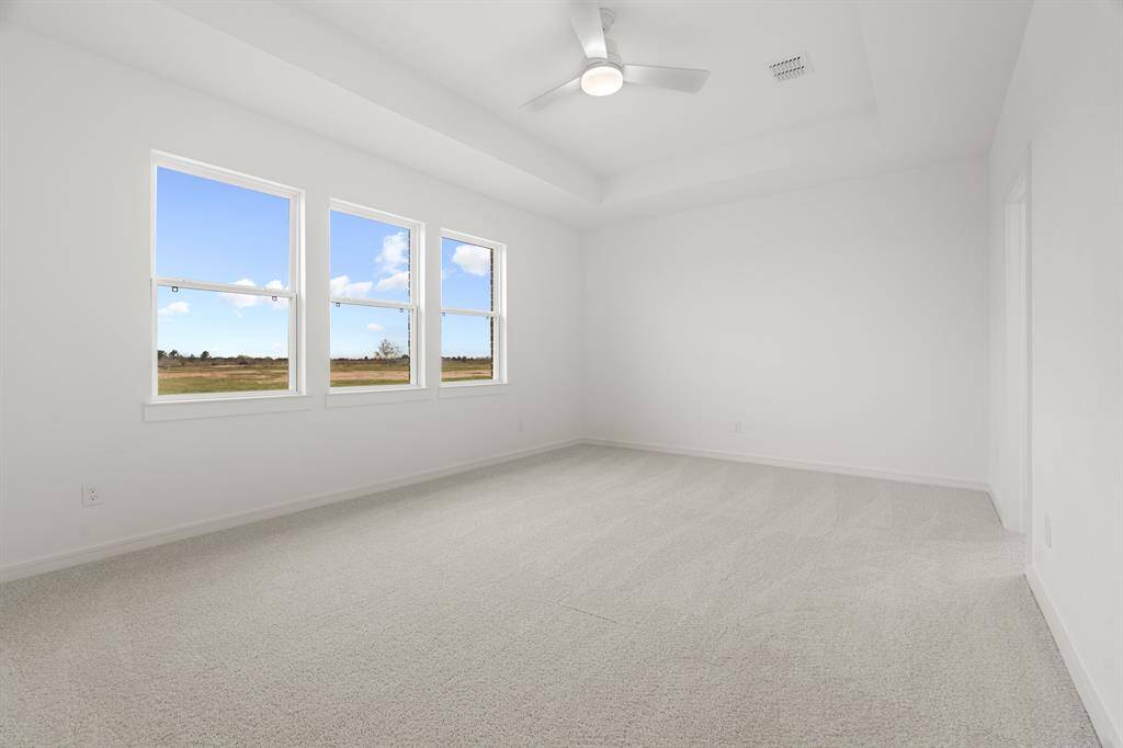 Spacious primary suite (*Photo not of actual home and used for illustration purposes only.)