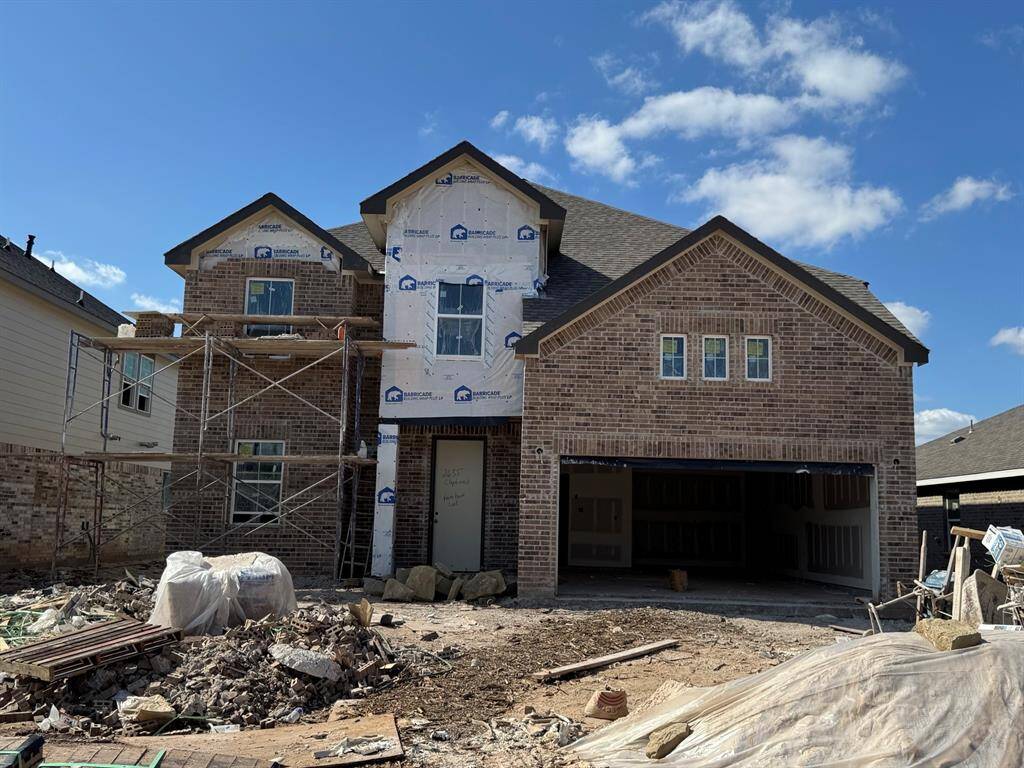 Two story home with 4 bedrooms, 3.5 baths, and 2 car garage.