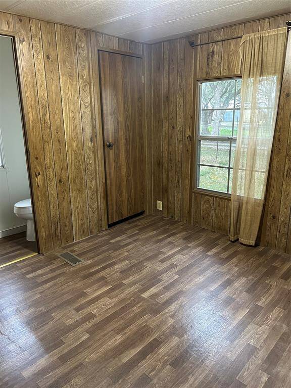Recently replaced Wood look Vinyl floor in Second Bedroom
