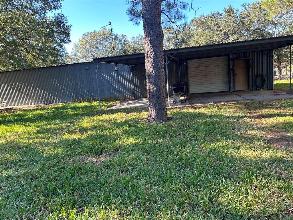 View of the two car carport attached to the barn