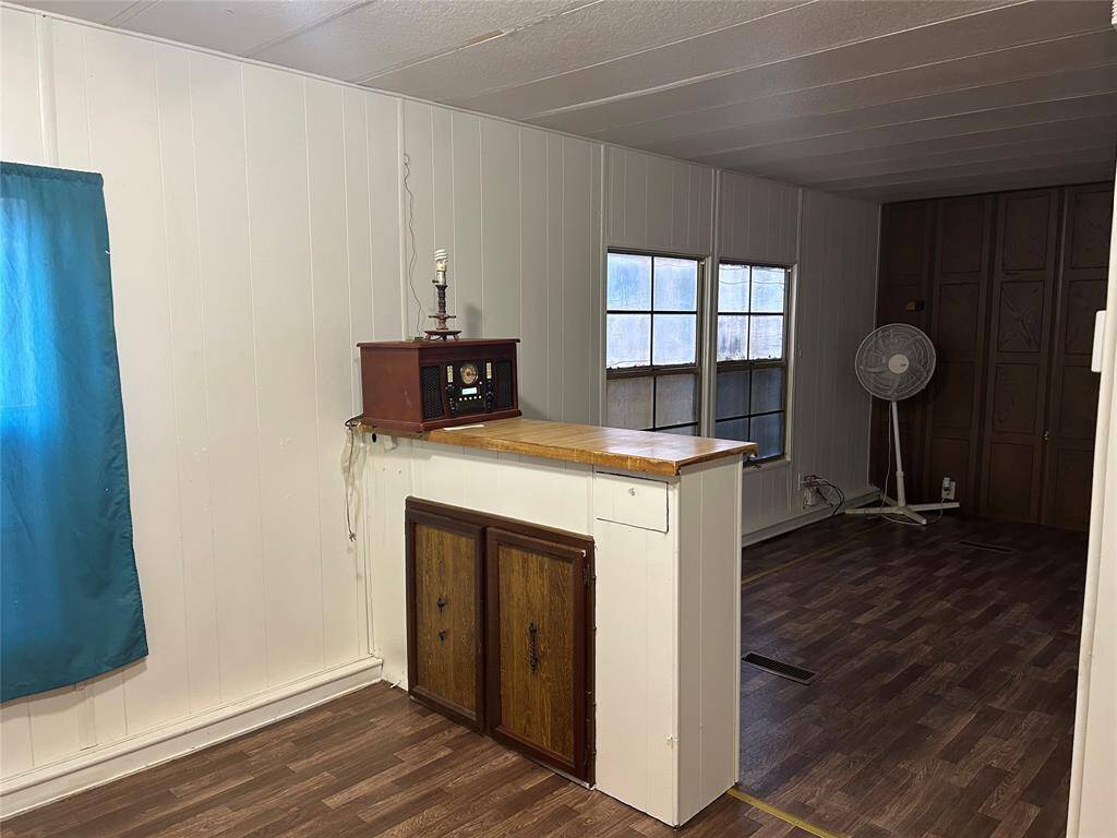 The bar separates the kitchen from the family room