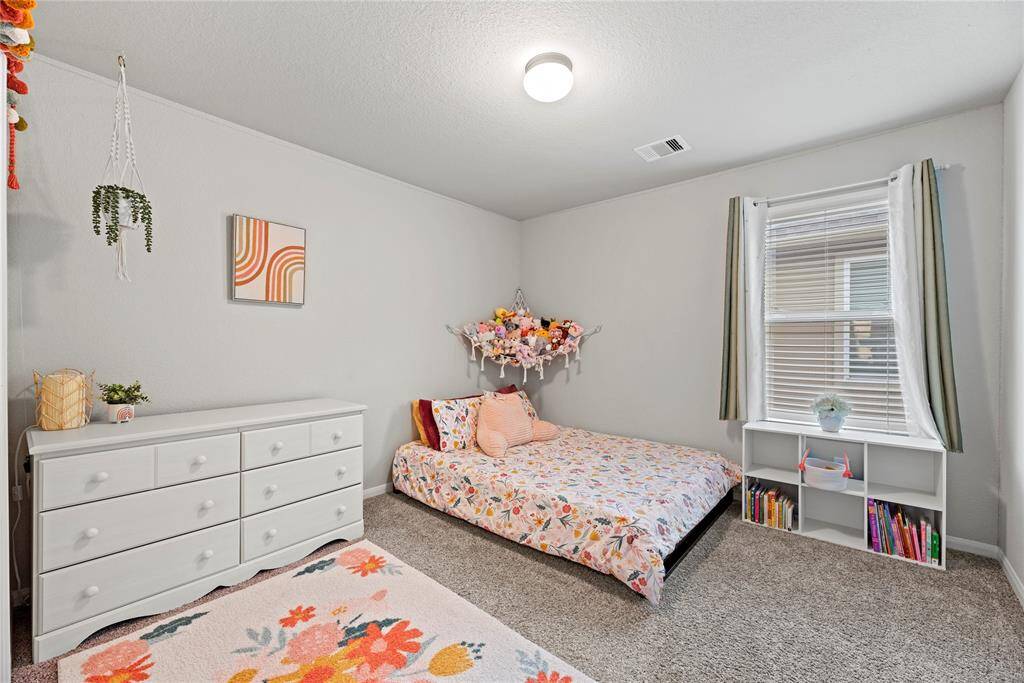 Third upstairs bedroom.