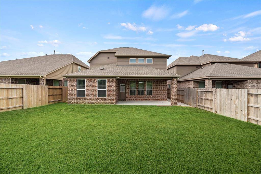 Plenty of backyard for the kids or pets, perhaps a swimming pool in your future.