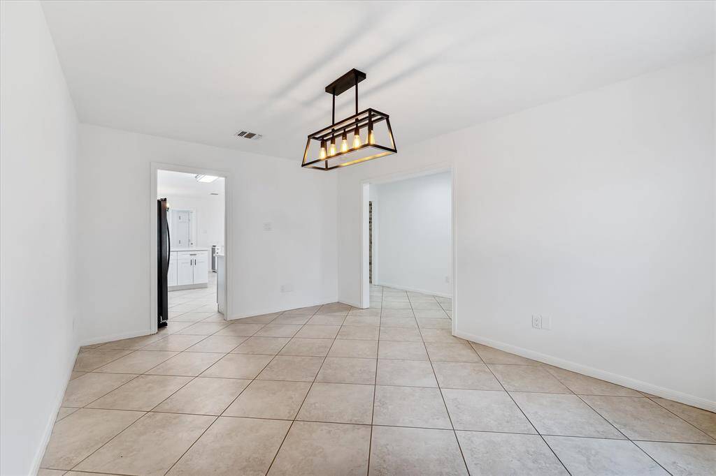 Formal dinning area with easy access to Kitchen...