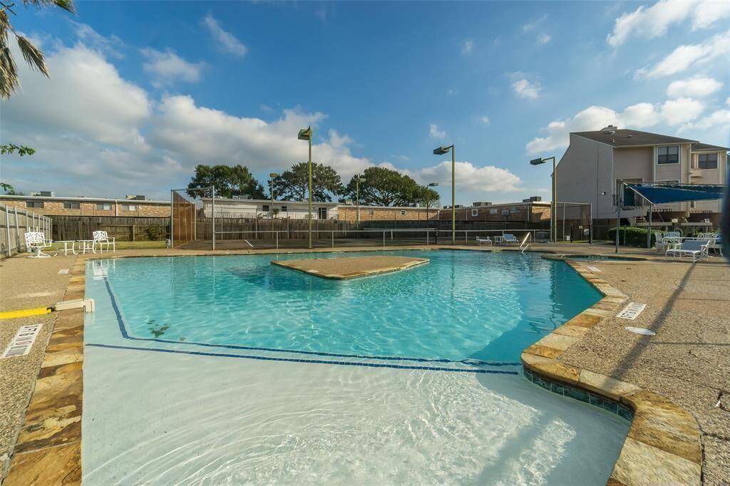 Ariel view of pool and tennis courts