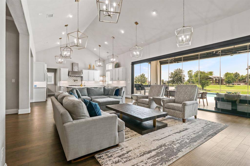 This open concept space allows for ease of conversation from the Luxurious Living Room to the Gourmet Kitchen, great for entertaining!