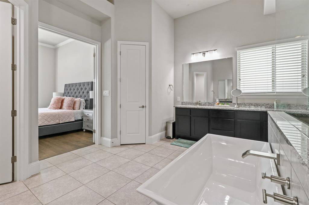 Enter the Peaceful Primary OAsis which offers a linen closet, double sinks, a separate soaking tub and a glass enclosed walk in shower!