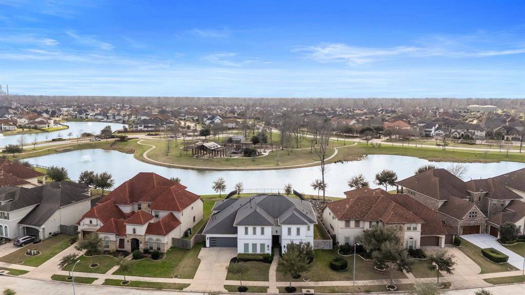 This incredible two story home in the sought after community of Avalon at Riverstone offers lake front views!