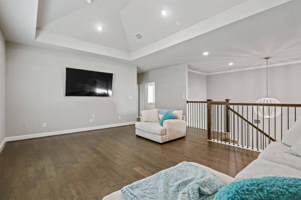 The Game Room opens to the floor below and offers enough space for a pool table!