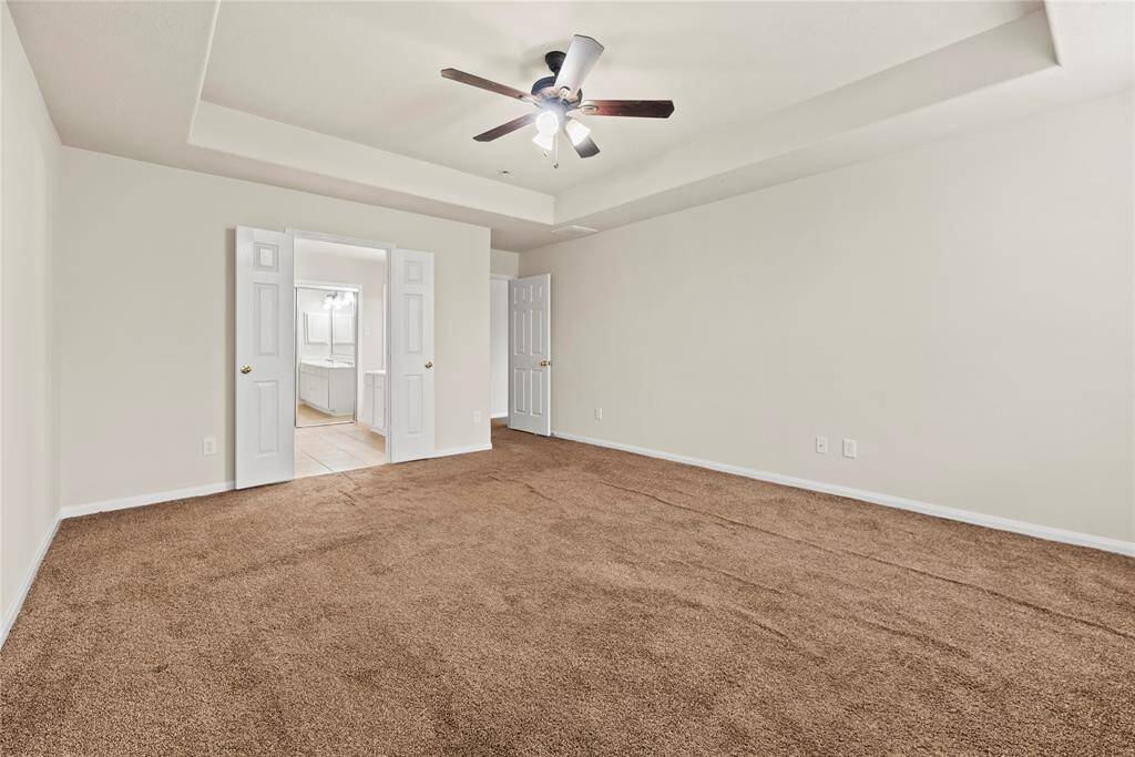 Coffered ceilings create a dramatic focal point that complements the overall aesthetic.