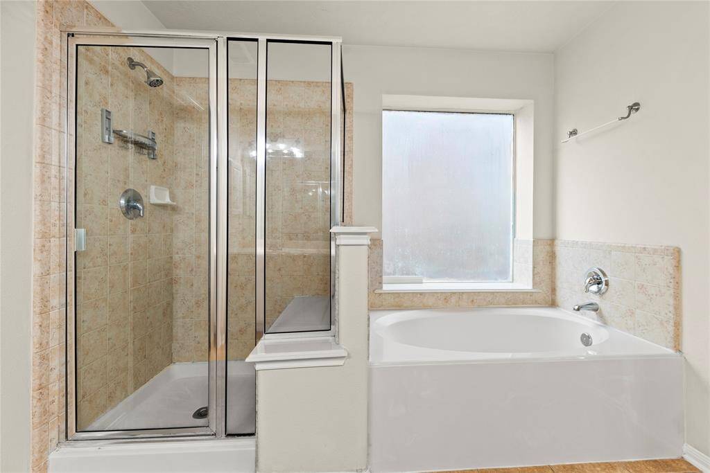 Relax in your deep soaking tub or opt for a quick rinse in the separate shower.