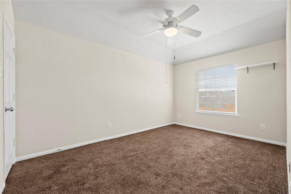 The thoughtfully designed layout of the third bedroom allows for natural light to flood the room, creating a warm and welcoming atmosphere.