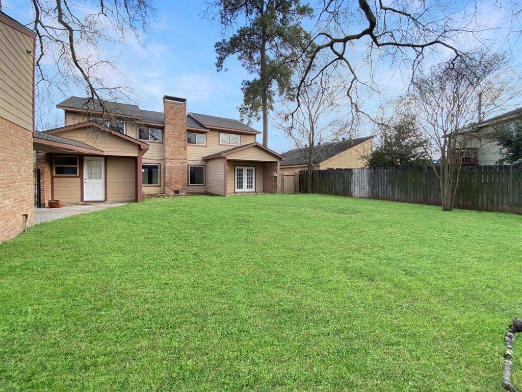 Spacious backyard with plenty of room for outdoor activities.