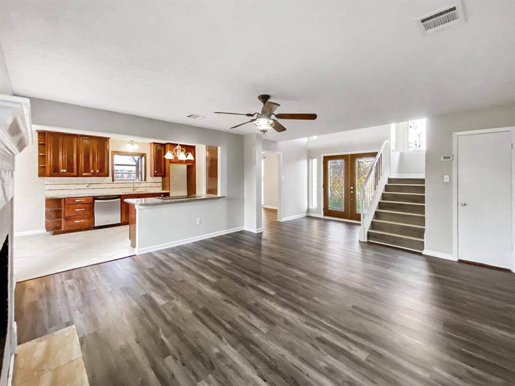 Open floor plan with a living and kitchen combo.