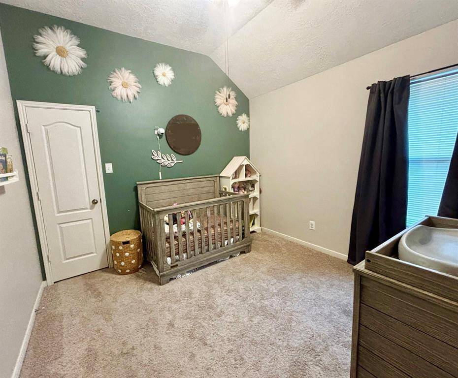 Adorable 3rd bedroom toward front of the house, with a larger closet! **NEW CARPET IN 2020 with little traffic!**