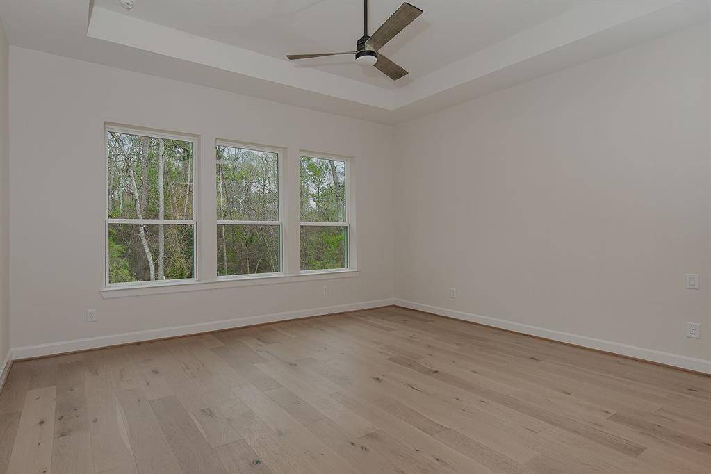 Primary Bedroom with upgrades tray ceiling detail