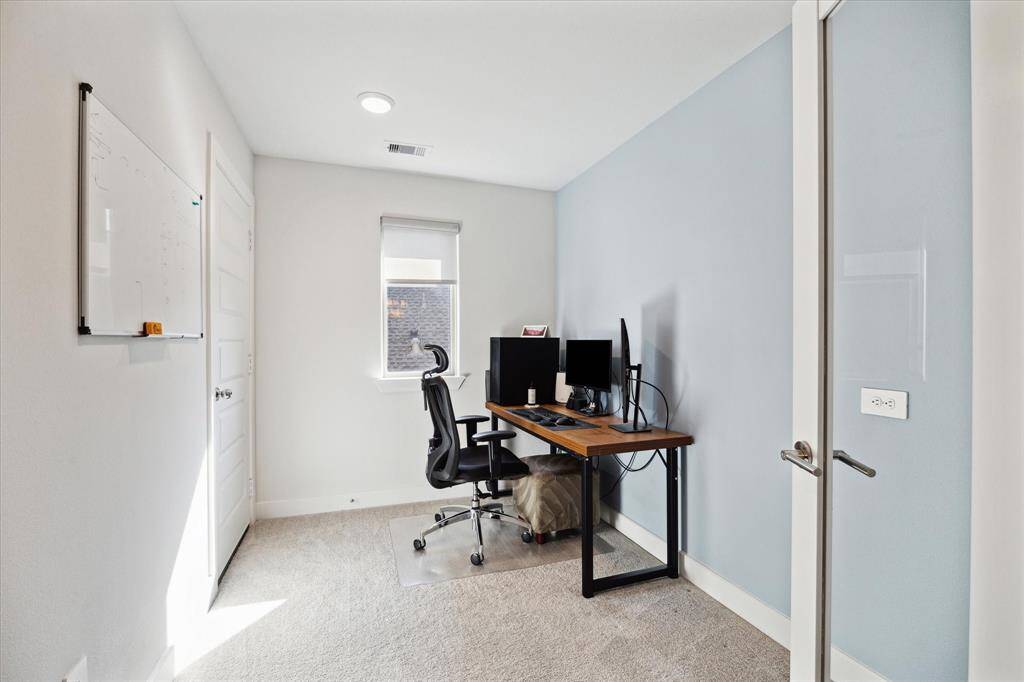 This area has been closed off with French doors making it perfect to use as a 2nd home office/study!