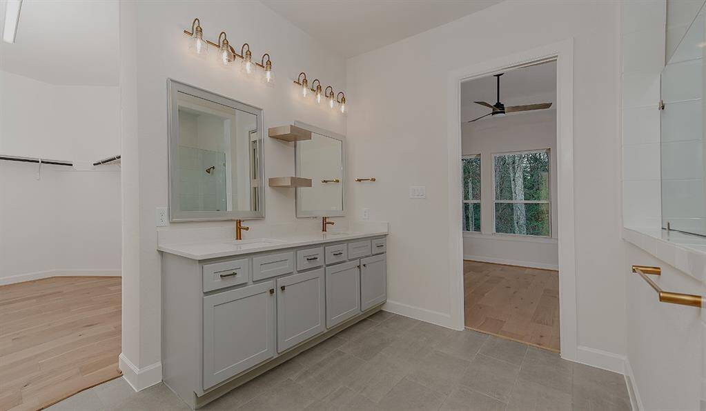 Primary Bathroom with dual vanities