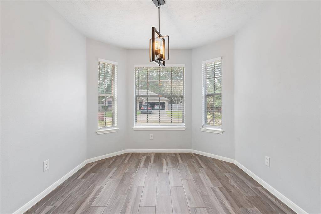 The dining nook overlooks the front yard.