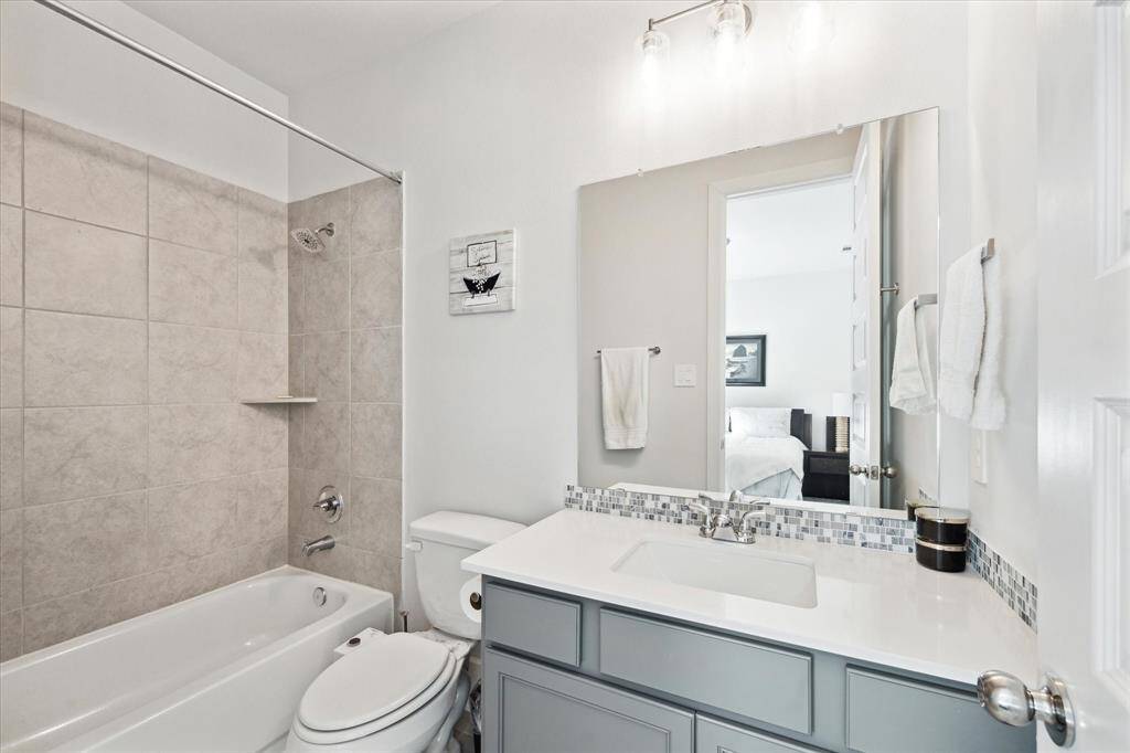 This is the bathroom located off the downstairs secondary bathroom!