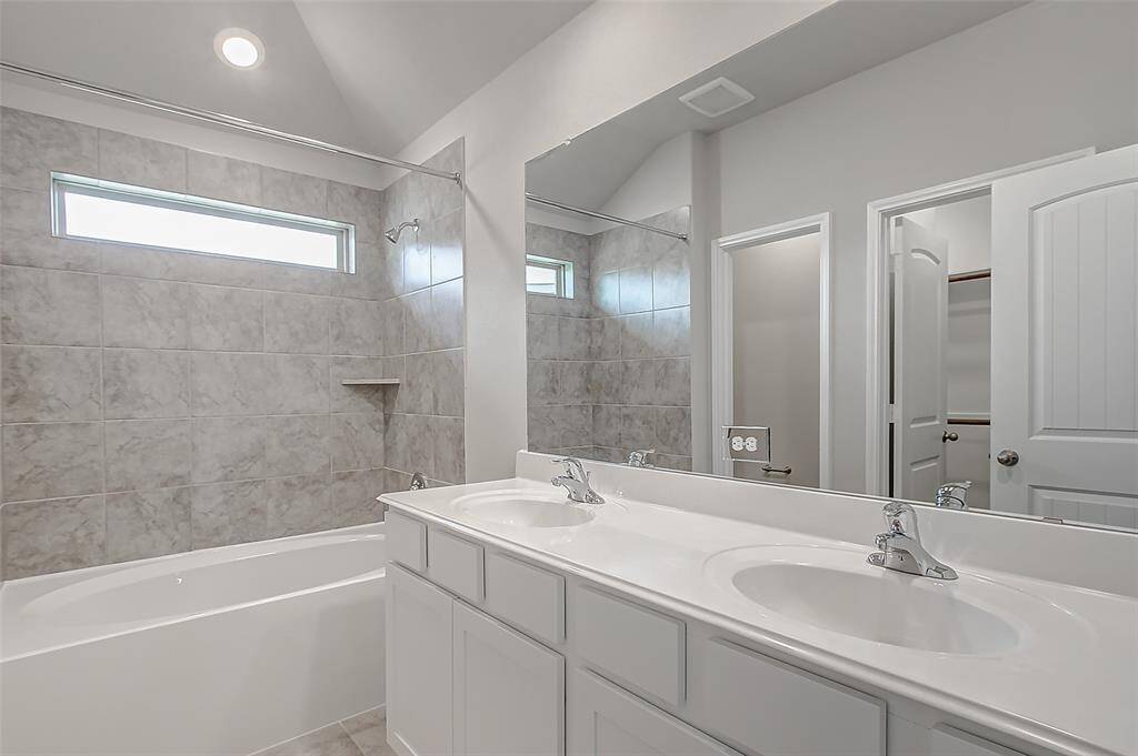Double sinks in primary bathroom. No need to take turns anymore.