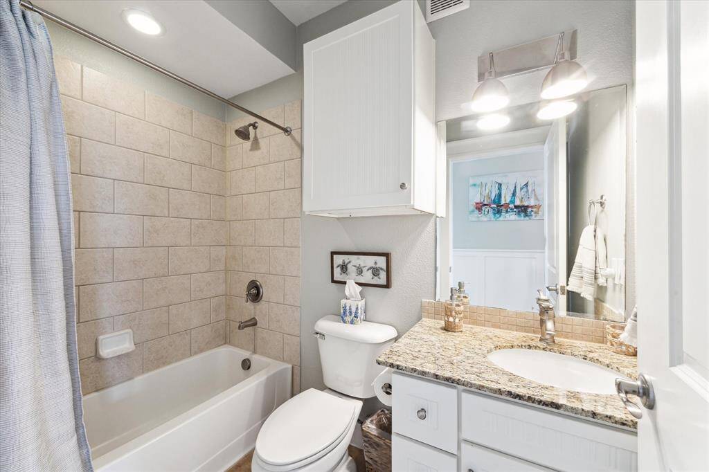 Hall Bath that serves and full bath for Bedroom 3 and guest bath