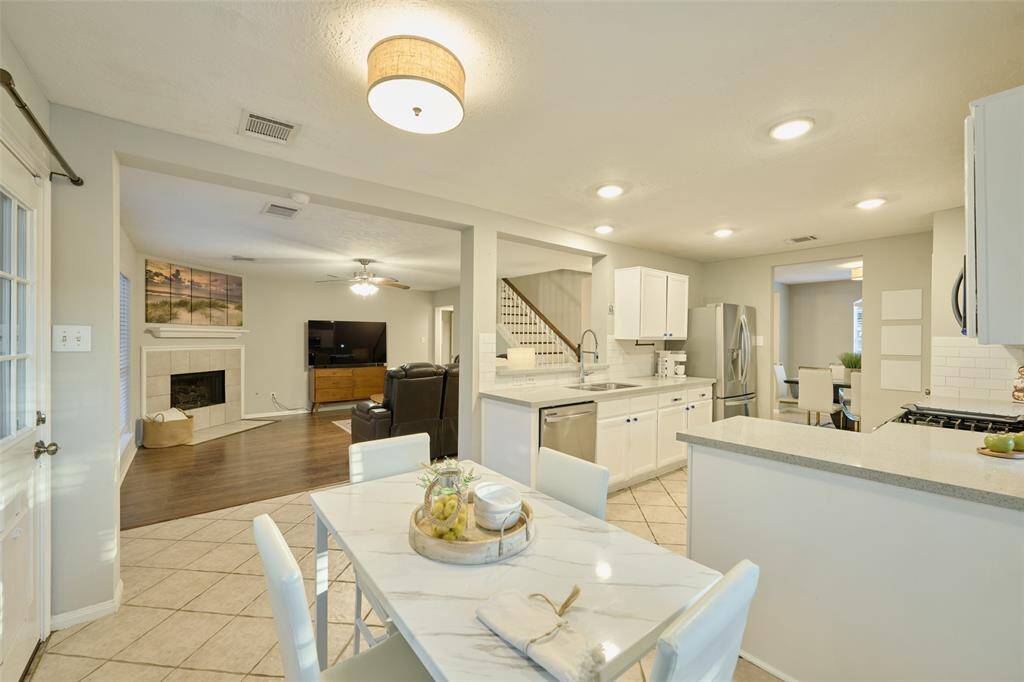 The kitchen is also open to the living room.