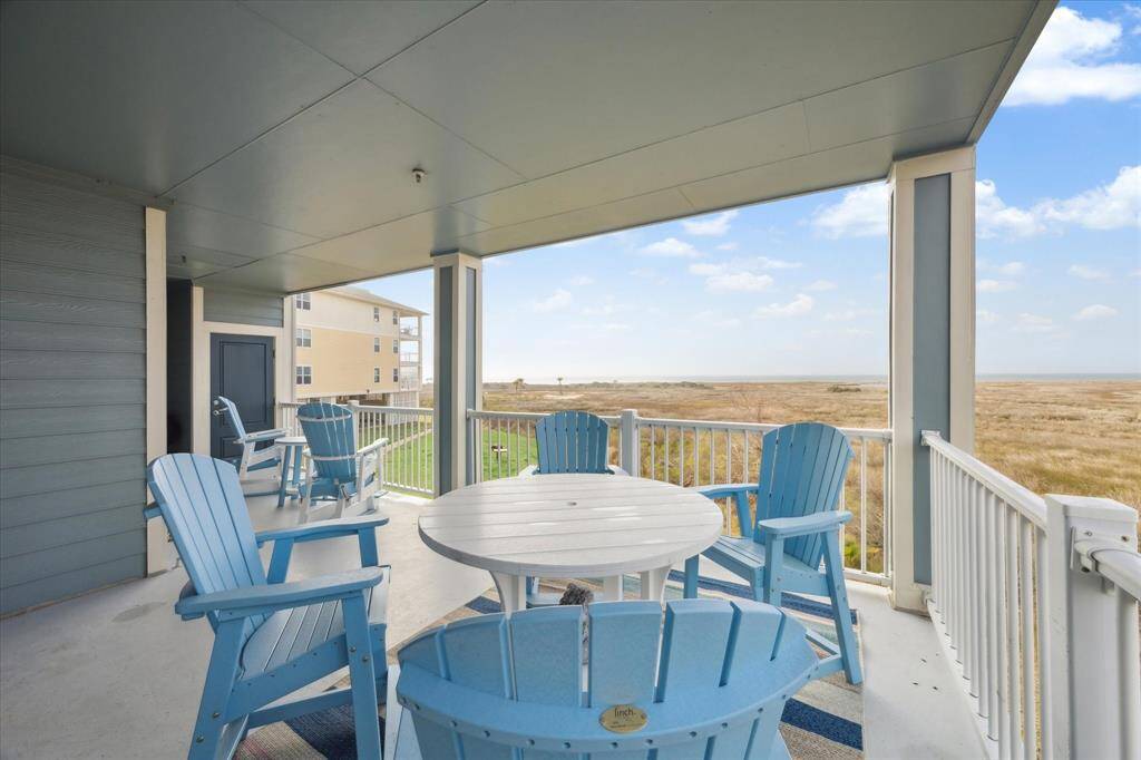Spacious balcony is a great place to relax and entertain.  Not shown, is an electric grill that conveys with the property.