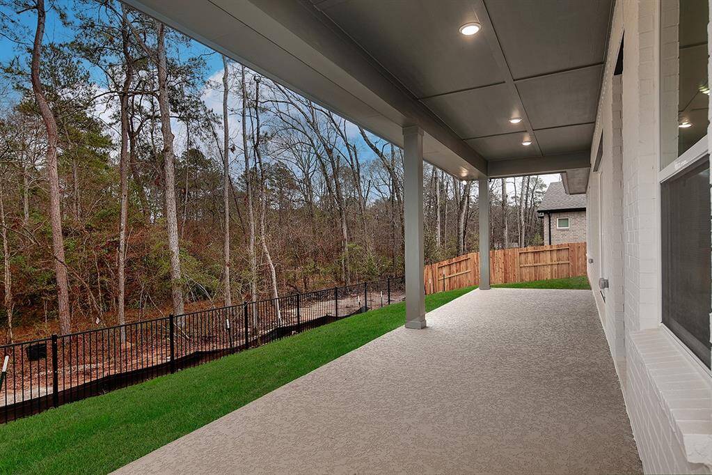 Oversized covered patio overlooking the scenic reserve