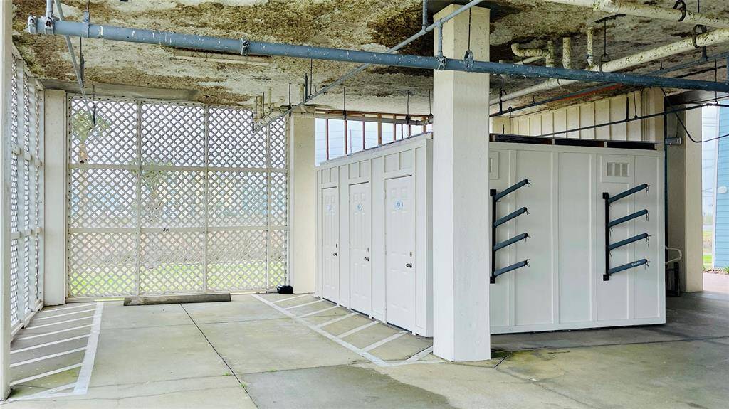 Each owner gets a Parking Space and lockable Storage Closet in the Garage.  The Racks are for kayak & paddleboard storage.  The storage closets are great for fishing gear, bicycles, and beach toys.