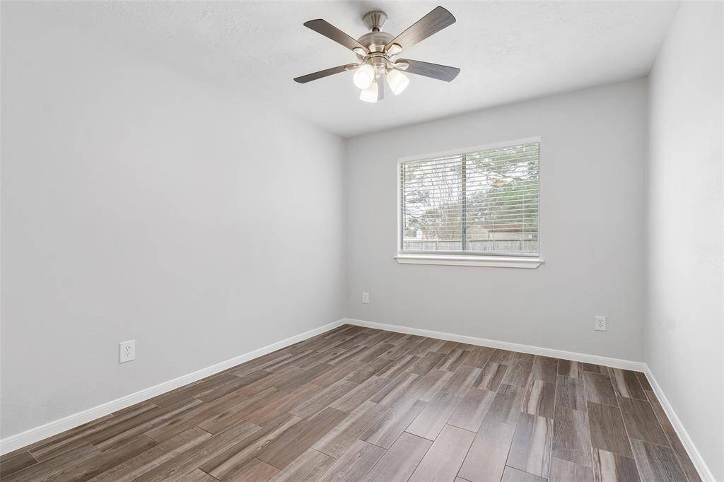 Updated secondary bathroom features Quartz counters, new bathtub and beautiful tiled shower.