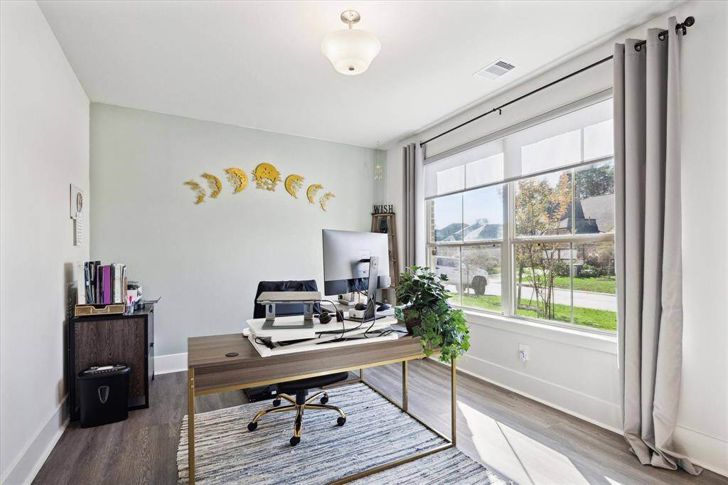 This bright home office/study is on the first floor