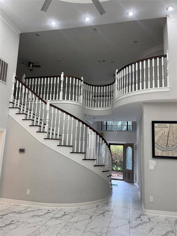 Overlooking entry, stairs and the 2nd floor game room