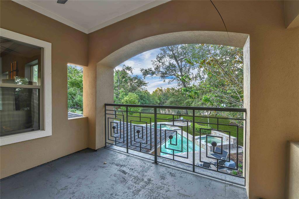 Bathed in natural light from numerous large windows, the game room exudes a bright and cheerful atmosphere, making it an ideal spot for family gatherings or friendly get-togethers.