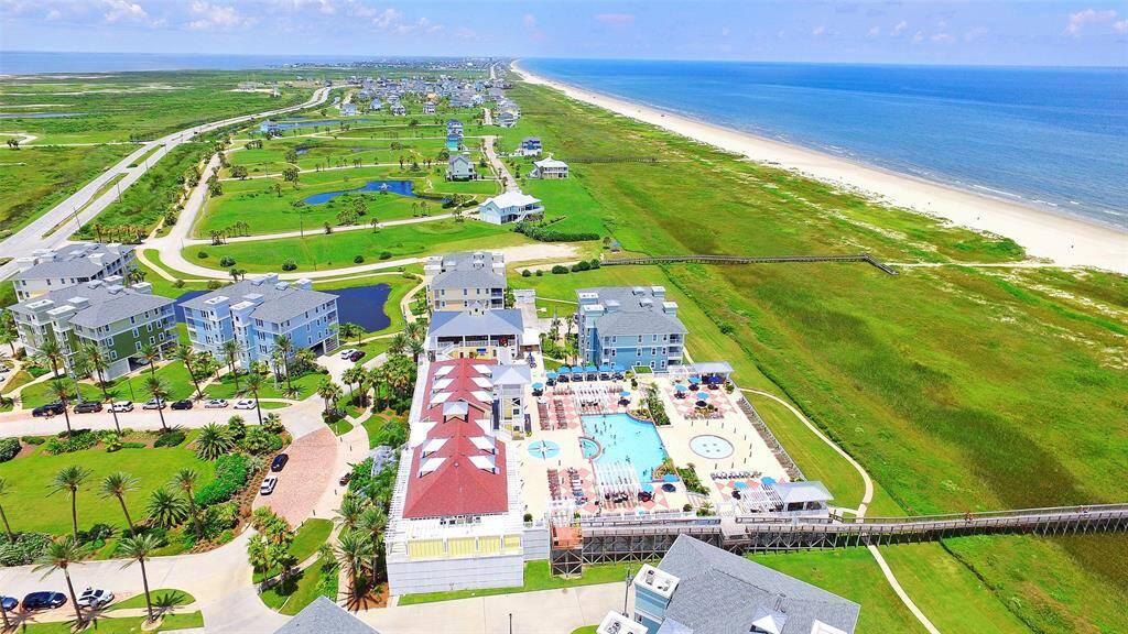 Residents have access to the Pointe West Beach Club, which is just a short golf cart ride away from the condo building.