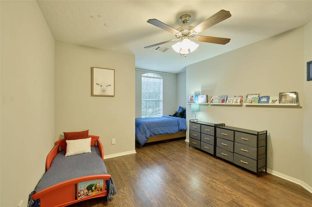 Take a look at this flexible secondary bedroom with ceiling fan.