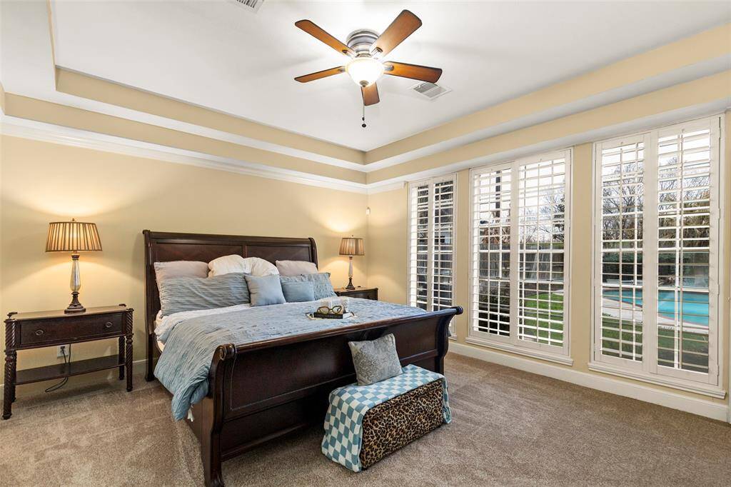 Warmly Lit with Stylish Features and Cozy Carpeted Flooring.