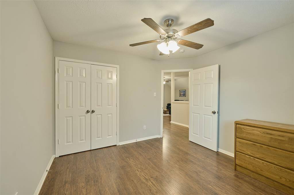 Take a look at this flexible secondary bedroom with ceiling fan.